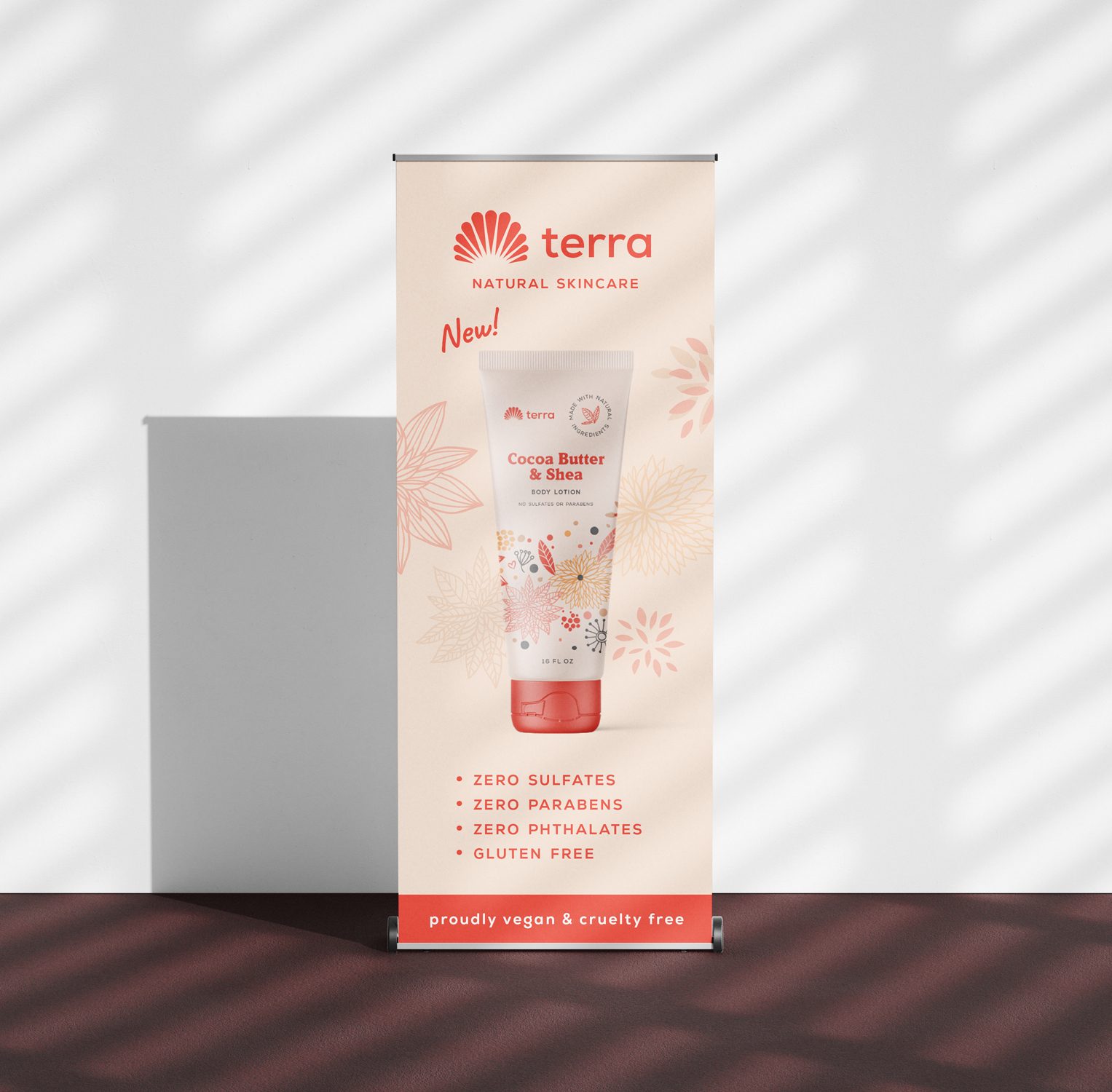 Terra Natural Skincare roll-up trade show banner featuring a body lotion tube and floral line art